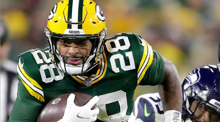 Green Bay Packers running back A.J. Dillon (28) against the Seattle Seahawks during their football game on Sunday November 14, 2021, at Lambeau Field in Green Bay, Wis.